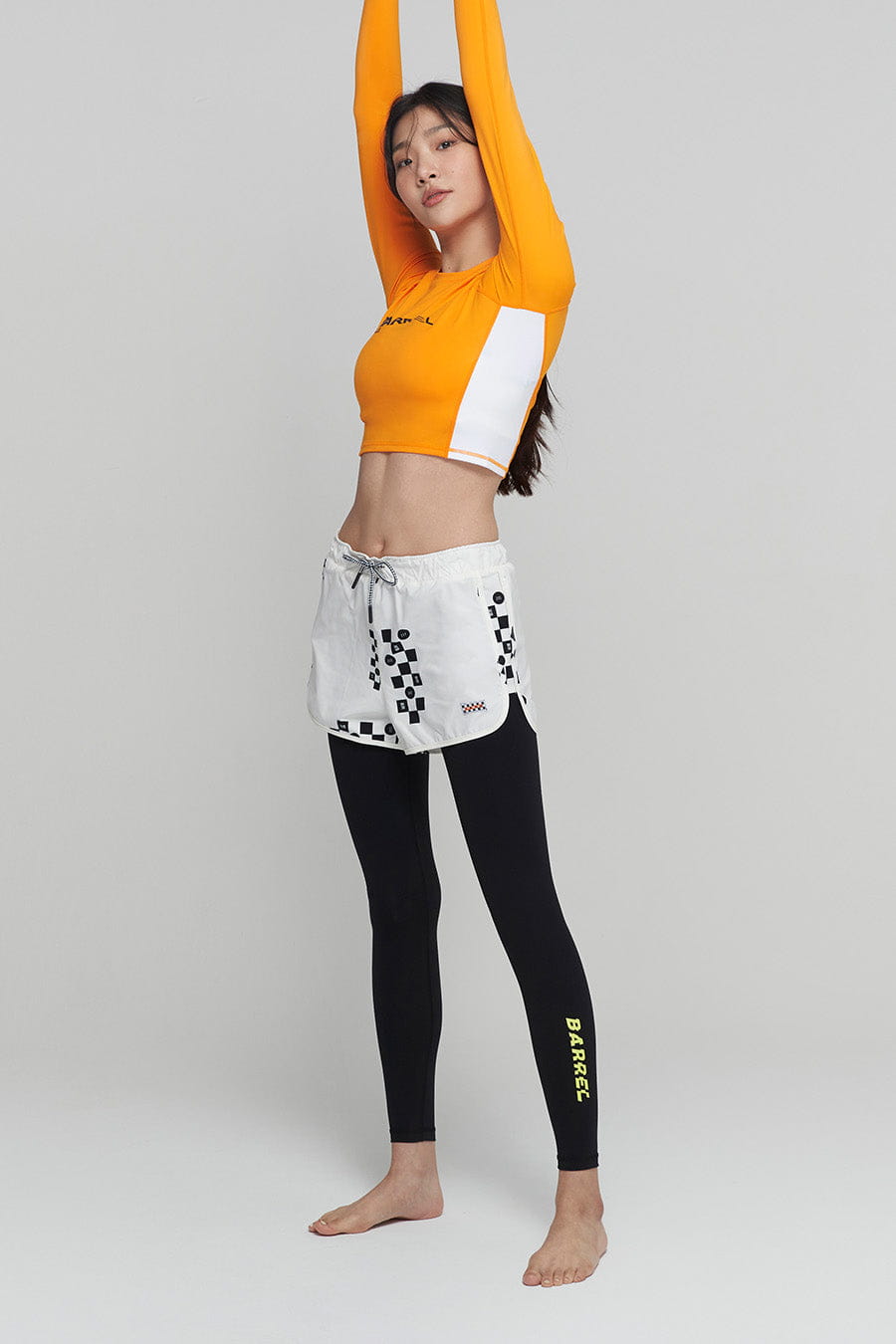 barrel_WomensMoveCropRashGuard_orange_image4