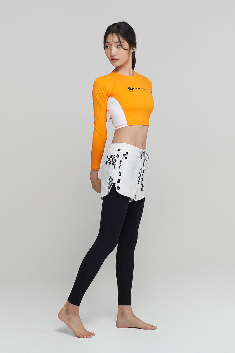 barrel_WomensMoveCropRashGuard_orange_image3